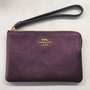 Authentic Coach wristlet, metallic purple